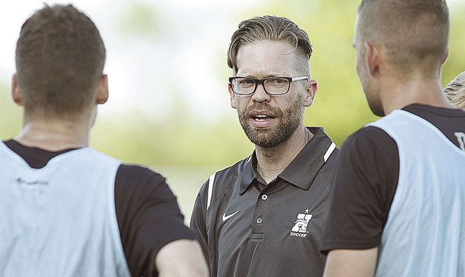 Aaron Champenoy was named the 2016 NAIA National Coach of the Year after leading Hastings to a 24-0-1 record.