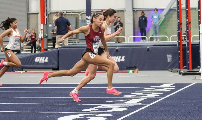 CWU's E'lexis Hollis (front) and SFU's Marie-Eloise Leclair both earned All-America status in the 60 meters.