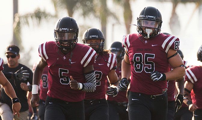 Quarterback Tyrone Williams, Jr. (left, 5) and tight end Lucas Widmer (85) are among nine returning offensive starters for Azusa Pacific.