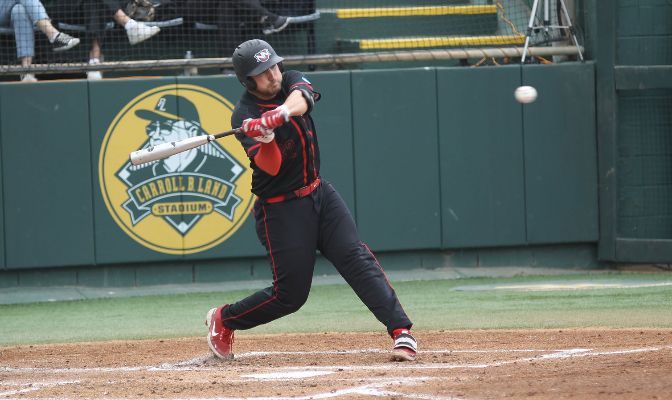 Despite hitting eight home runs as a team, Northwest Nazarene could not keep up with Point Loma's offense in two losses that eliminated NNU from the NCAA tournament. Photo by Josh Burkholder.