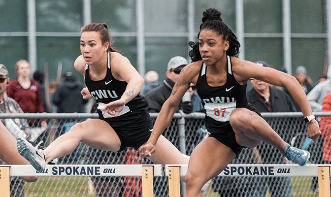 Central Washington's Sidney Trinidad (left, pictured with Erykah Weems), won the 400-meter hurdles at the War XII Meet and is now No. 6 on the GNAC All-Time List.