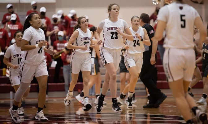 Central Washington women's basketball players Kizzah Maltezo (second from left, No. 21), Samantha Bowman (No. 23) and Kassidy Malcolm (No. 24) all received All-West Region Team honors from the D2CCA.