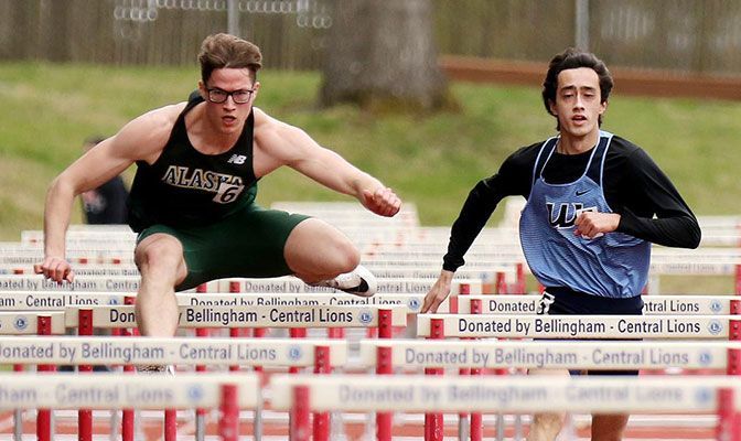 Hunter Flick (right) set the GNAC record in the 60-meter hurdles in a duel with Alaska Anchorage's Joshua Wagner at Saturday's UW Invitational.