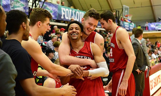 Ali Faruq-Bey (center) had 19 points in the win that advanced Western Oregon to its second consecutive GNAC Championships final game. Photo by Paul Dunn.