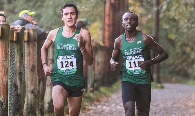 Michel Ramirez (left) and Edwin Kangogo ran the majority of the race together, with Kangogo pulling ahead late to win in 25:54.80. Photo by Nick Danielson.