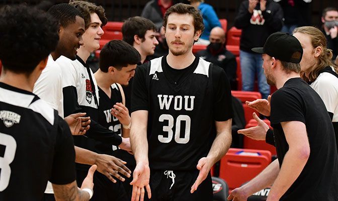 Cameron Cranston shared top scoring honors for WOU with 14 points, none bigger than his game-winning three-pointer. Photo by Ron Smith.