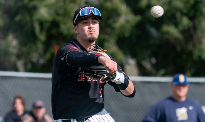 Zach Valdez drove in a run on a squeeze bunt in a 6-3 Western Oregon victory, emblematic of WOU's pitching and defense small-ball approach that has the Wolves in first place.