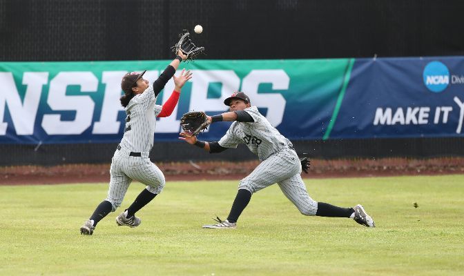 Western Oregon left fielder Levi Cummings and center fielder Jacob Maiben converge on a fly ball during Saturday's game against MSUB. Photo by Amanda Loman.