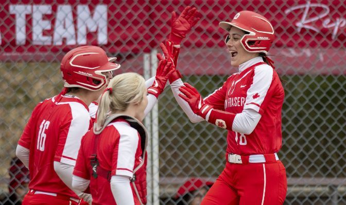 Simon Fraser received clutch hitting throughout a four-game sweep of Western Oregon, including from Hanna Finkelstein (right), who had two game-winning hits in the series. Photo by Wilson Wong.