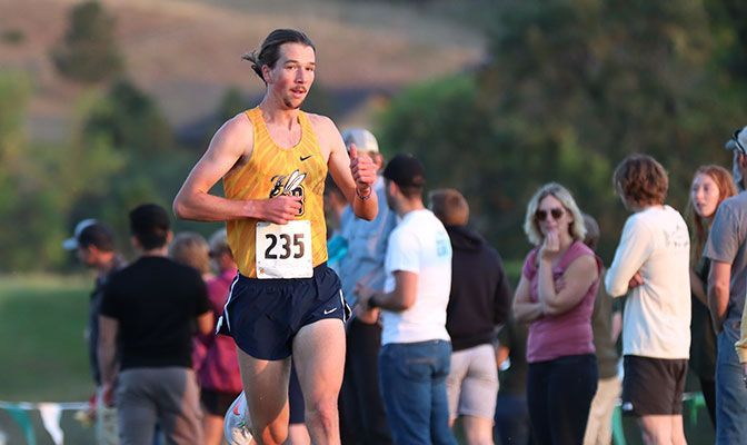 Ase Ackerman opened the 2021 season by winning the Gage McSpadden Memorial in a time of 19:21.5 over 6,000 meters. He was named the GNAC Men's Cross Country Athlete of the Week.