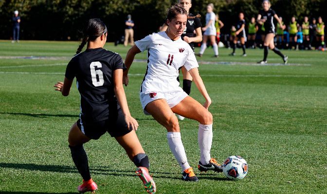 Claire Neder (white) scored the match's opening goal on a penalty kick in the 12th minute and assisted on SPU's second goal.