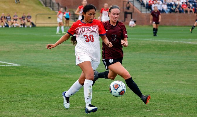 GNAC Player of the Year Makena Rietz (right) battles for possession during an NCAA tournament quarterfinal match against DBU.