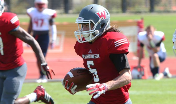Western Oregon's Paul Revis set a GNAC single game record with 250 receiving yards in the Wolves' 33-7 victory over Simon Fraser.