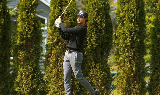 Simon Fraser's Ryan Hodgins recorded the first albatross in GNAC Championships history in the second round to set the lowest single round of the day with a 3-under-par 68. | Photo by Shawn Toner