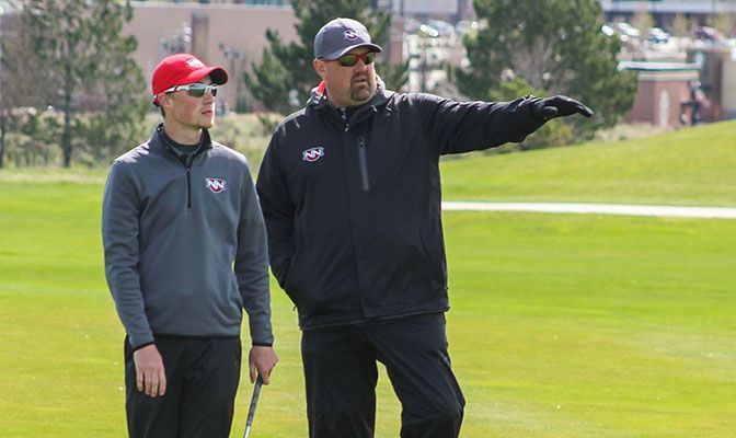 Between his time as a student, coach, administrator and faculty member, Craig Stensgaard (shown here with son Jared) has been a presence on the NNU campus for 30 years.