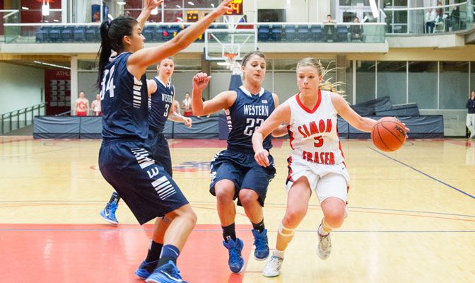 SFU's Ellen Kett (right) is second in the GNAC contributing 5.5 assists per game.