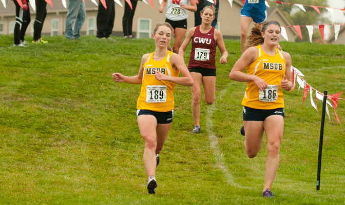 MSUB's Jinise Osborne (189), running alongside teammate Renae Hepfner (186) who has a 3.95 GPA, is one of three GNAC cross country athletes with a 4.00 GPA.