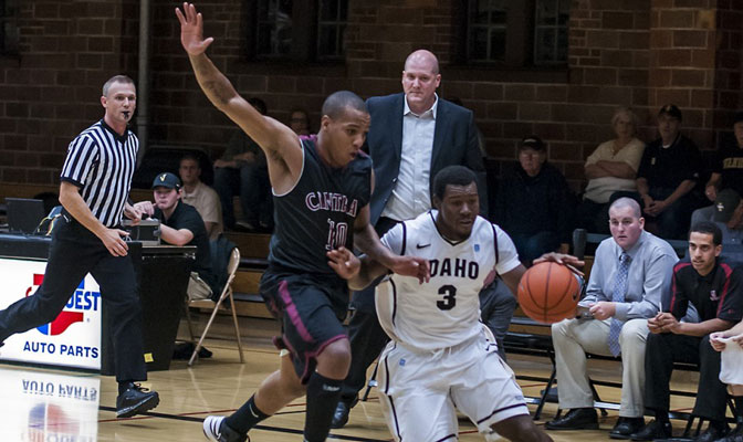 CWU head coach Greg Sparling watches as Chris Holmes guards a University of Idaho player earlier this season at Moscow.