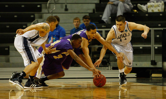 Richard Woodworth (far right) has helped lead Western Washington to a No. 2 national ranking this winter.