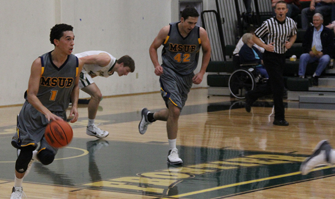 MSUB senior point guard Kalob Hatcher (left) is leading the GNAC with 7.6 assists per game and had 24 in last weekend's victories.