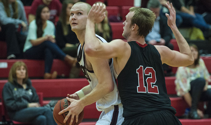 Patrick Simon (with ball) finished the season ranked No. 1 nationally in 3-point percentage, the second straight year a SPU player has been the national leader in that category.