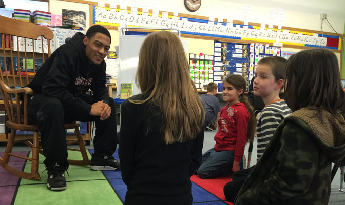 Central Washington guard Dom Williams got a chance to interact with elementary school kids while in Billings for the GNAC tournament.