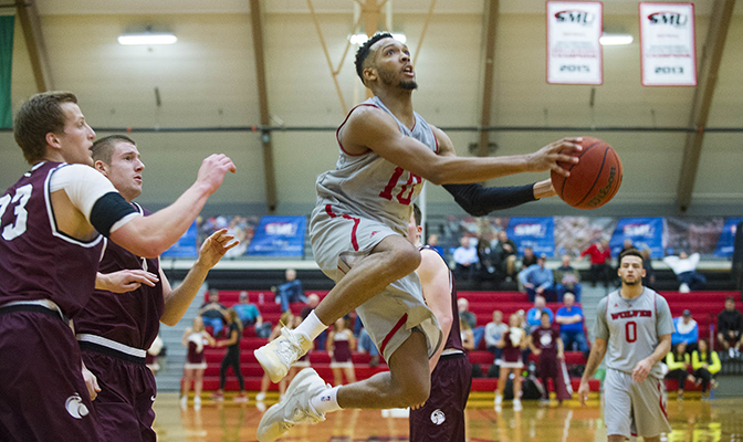 Julian Nichols scored 14 points for Western Oregon as they advanced to their first GNAC Championships final where they will play No. 2 seed Alaska. Photo by Dan Levine.