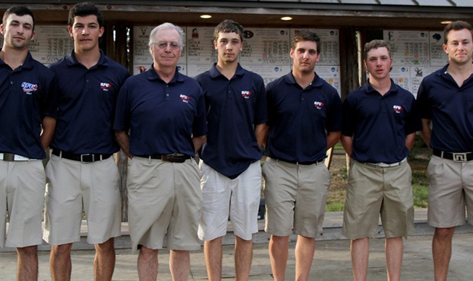 SFU men's golf head coach John Buchanan, pictured here with the 2013-14 team, was picked as the GNAC Coach of the Month for May.