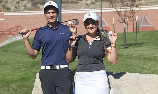 Scott Larson and Shealyn Hafer with the balls they hit holes-in-one with this season.