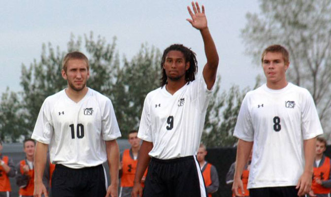 Brice Holliday (center) scored three goals to lead Sioux Falls to its first win of the season Saturday (USF Photo)