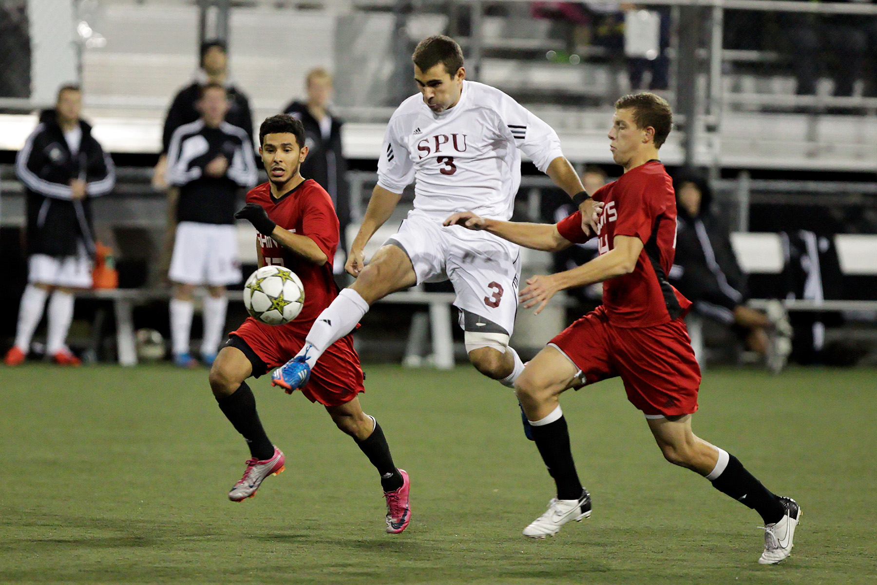 SPU midfielder Christopher Morris (middle) had two near misses in Thursday's game  (Photo by Andy Towell)