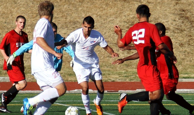 SFU's Ryan Dhillon (middle) was selected the GNAC Offensive Player of the Week.