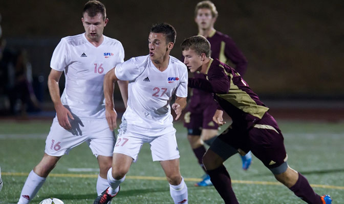 Simon Fraser's Michael Winters (16) earned first team NSCAA All-American honors (Photo by Ron Hole).