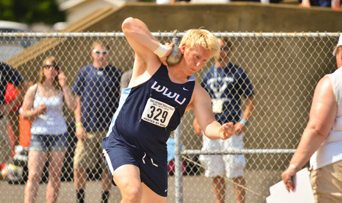 Frank Catelli won the shot put Saturday at UW with a school-record throw of 55-10 1/2.