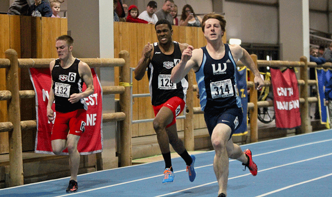 Western Washington's Alex Donigian (314)  races to a win Saturday in 200. Running alongside is NNU's Andrew Curtis and Rimar Christie (Photo by Loren Orr)