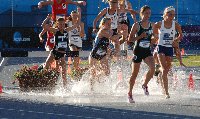 WWU's Katelyn Steen (center) was in third place early but rallied to post the best time Thursday in the steeplechase prelims (Photo by Barrett Henderson)