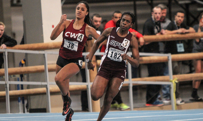 SPU's Jahzelle Ambus (182), running alongside CWU's Tiana Banfro (38) had the best prelim time in the 400 meters and the second best in the 200 meters (Photo by Loren Orr)