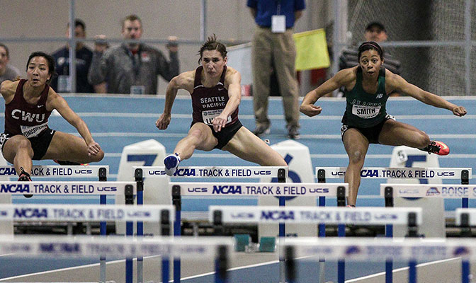The top-three finishers in the women's 60-meter hurdles, won by CWU's Mariyah Vongsaveng (left), were within .004 seconds of each other. Photo by Loren Orr.