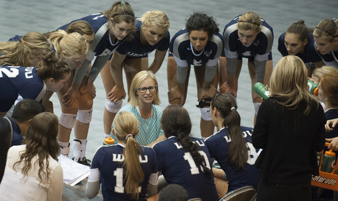 Western Washington head volleyball coach Diane Flick (center) has the Vikings off to a 13-1 start this season and was featured on the latest episode of GNAC Insider.