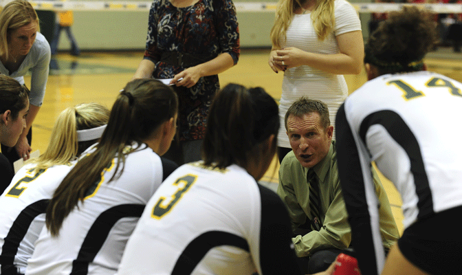 UAA volleyball head coach Chris Green (center) discussed his team's upcoming match against WWU, who is tied with the Seawolves for first place in the GNAC standings.