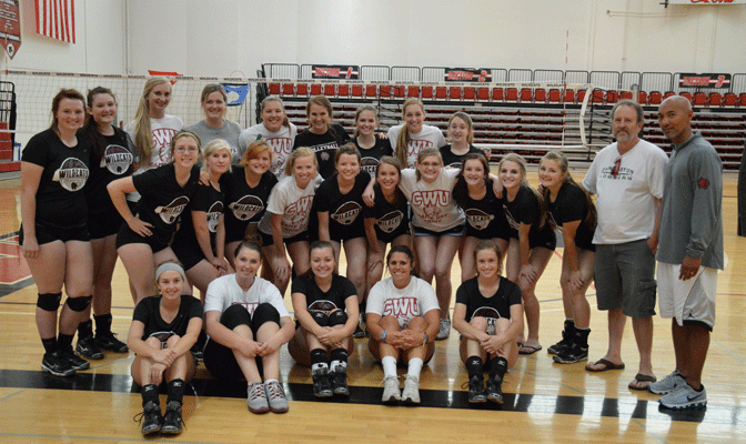 Darrington High School and CWU players pose for photo at volleyball camp.