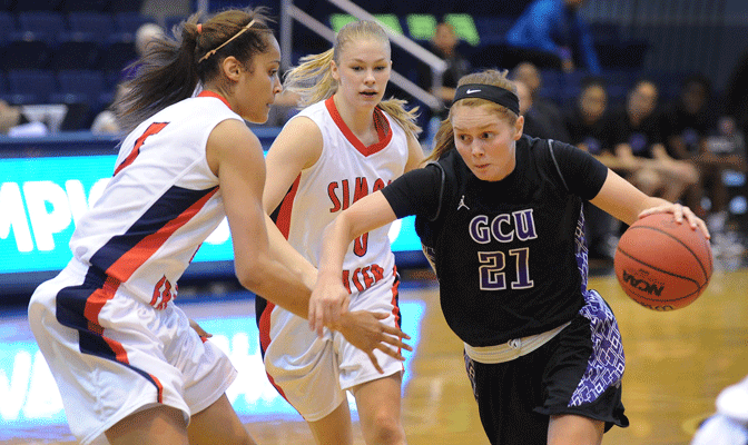 Nayo Raincock-Ekunwe (left) and Kristina Collins (middle) led SFU with 15 and 19 points, respectively, Monday. Maylinn Smith (right) paced Grand Canyon with 17 points (Photo by Dan Levine).