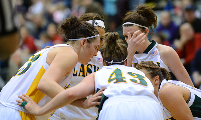UAA players huddle during break in action to plot strategy during game earlier this season versus CWU (Photo by Sam Wassom)
