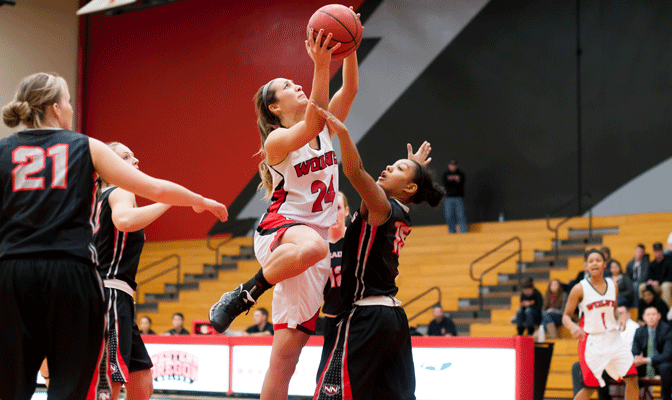 WOU's Dana Goularte (white) earned Red Lion Player of the Week honors after averaging 22.5 points and hauling in a career-high 17 rebounds against NNU last week.