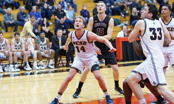 Seniors Drew Dyer (UCSD) and Tanner Giddings battle for a board in Friday's NCAA West Region first-round action. Dyer scored 22 points and the Tritons got the best of the Wildcats 76-64.