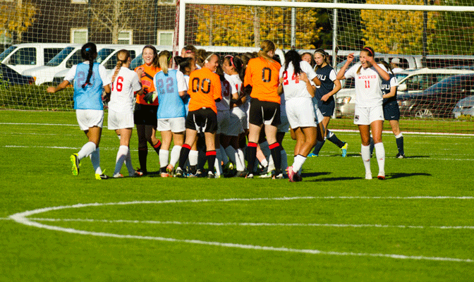 Western Oregon celebrates a 1-0 victory over No. 2 Western Washington in Monmouth, Ore., on Saturday.