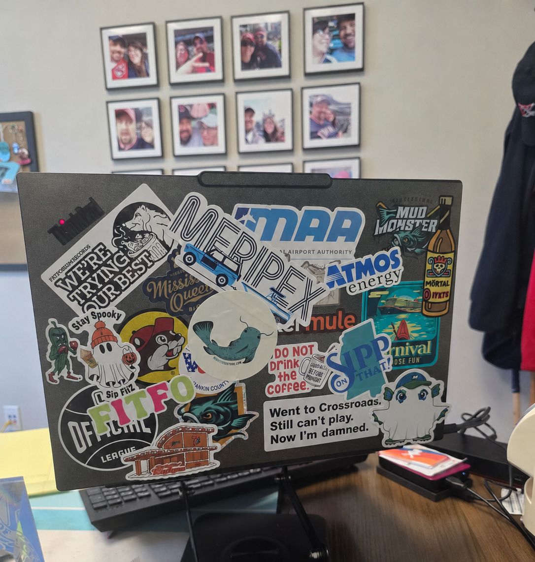 Ghost Fish sticker on laptop