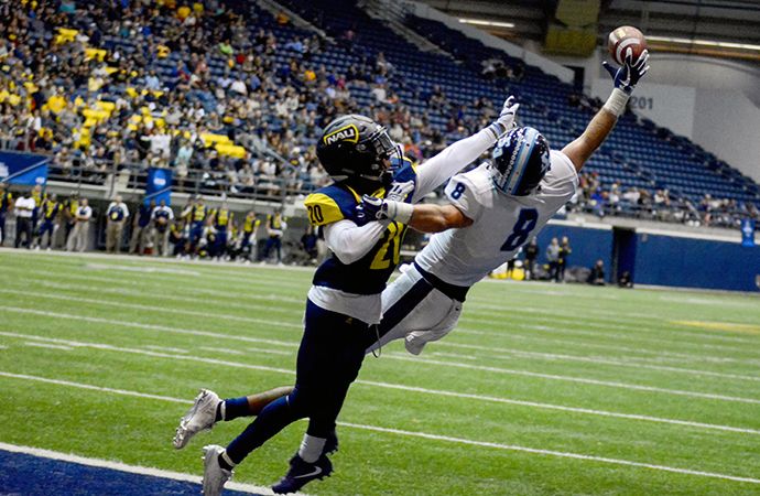 Justin Priest's one-handed touchdown catch was an early highlight in the Toreros rout of the Lumberjacks. Photo by Anna Bradley.