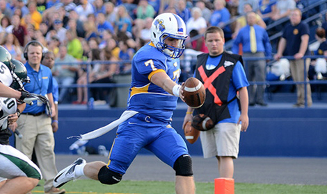 Morehead State's Zach Lewis' 12-yard rushing touchdown was one of five scores he was responsible for in a 55-0 victory over Southern Virginia, Thursday. (Photo by Guy Huffman)